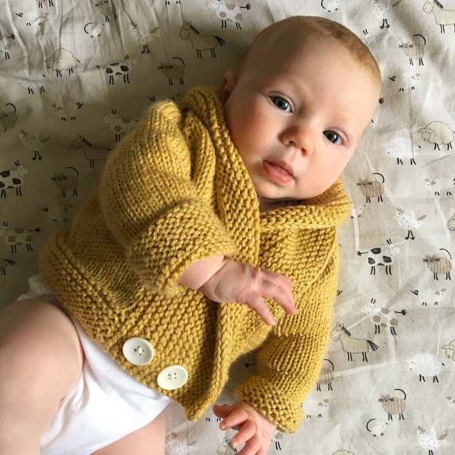 Hand knit baby cardigan